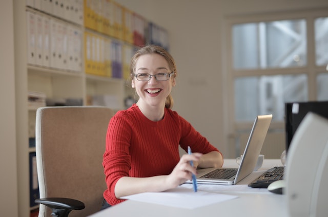 woman happy with laptop